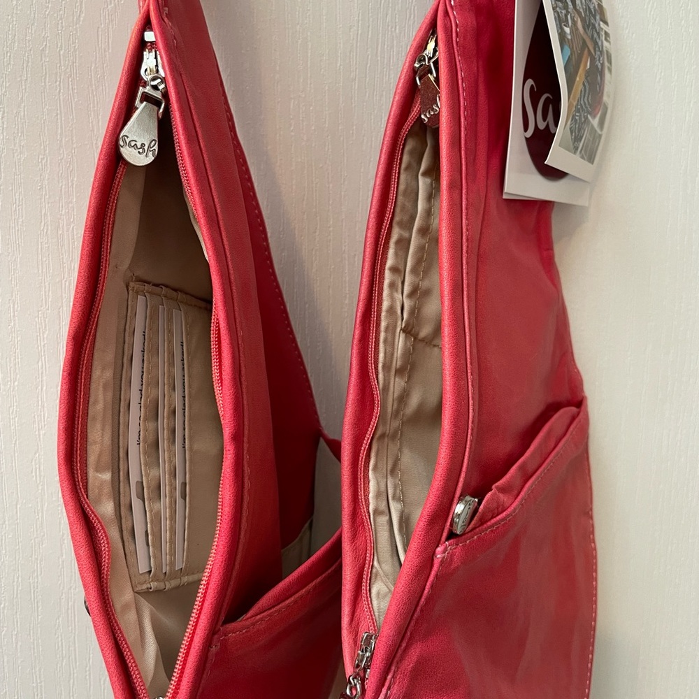 Beautiful Coral Leather SASH Bag. Never used, tags attached.